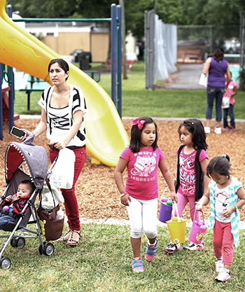 mother and children in a park